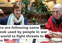In Detroit, Mich., volunteers with the Detroit People’s Assembly put together whistle kits designed to alert the community when immigration agents are nearby. Jim West/UCG/Universal Images Group via Getty Images
